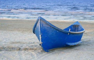 Boat on a beach clipart