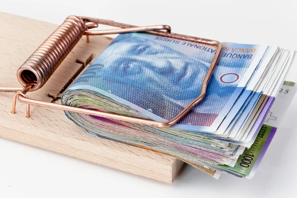 stock image Swiss franc in mousetrap