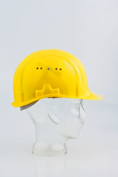 Bauhelm um trabalhador da construção civil — Fotografia de Stock