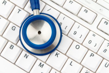 Computer keyboard and stethoscope. it for physicians. clipart
