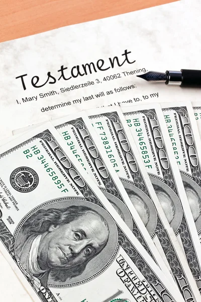 Dollar currency notes and english testament — Stock Photo, Image