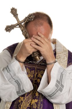 Abuse in the church. priest with handcuffs clipart