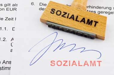 Wood stamp on the document: social services clipart