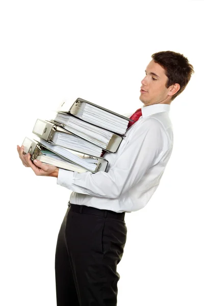 stock image Manager in the stress with stacks of files
