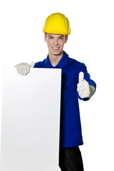 Apprentice / trainee as a craftsman and poster — Stock Photo, Image
