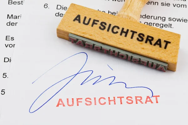 Wood stamp on the document: supervisory board — Stock Photo, Image