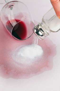 Red wine stains. glass of red wine and salt clipart