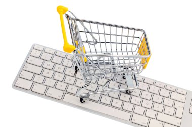 Cart and keyboard. online shopping clipart