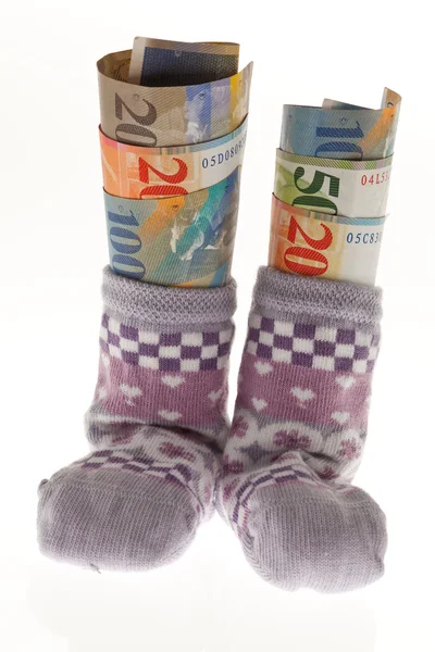 Κάλτσες των παιδιών σε ελβετικά φράγκα — Φωτογραφία Αρχείου