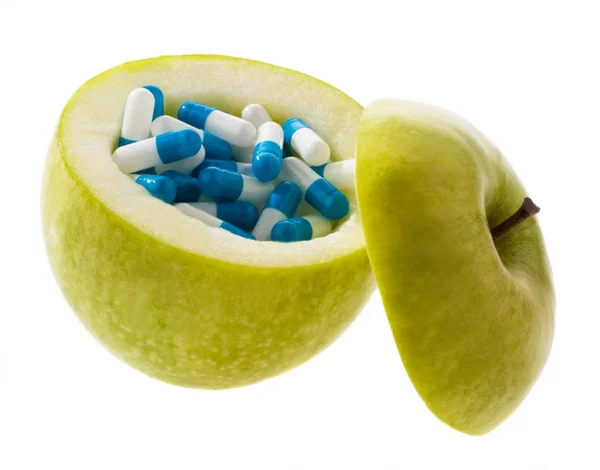 Apple tabletter med kapslar. — Stockfoto