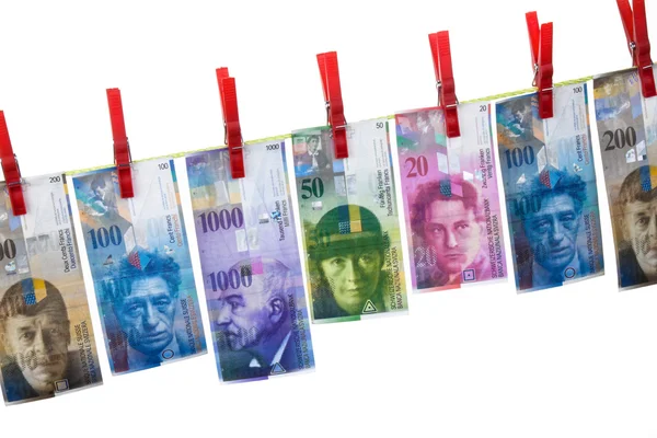Money laundering by swiss franc — Stock Photo, Image