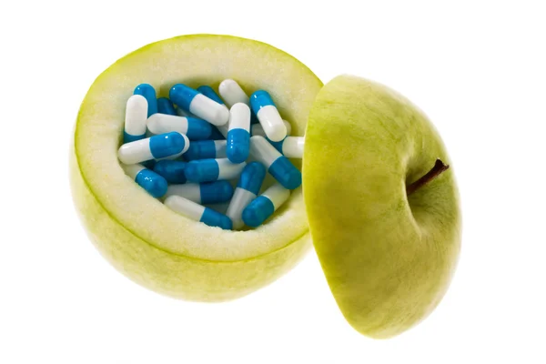 stock image Apple tablets with capsules.