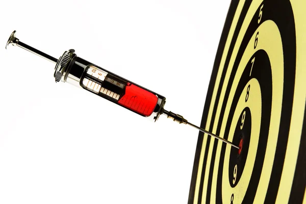 Syringe injection into a target — Stock Photo, Image