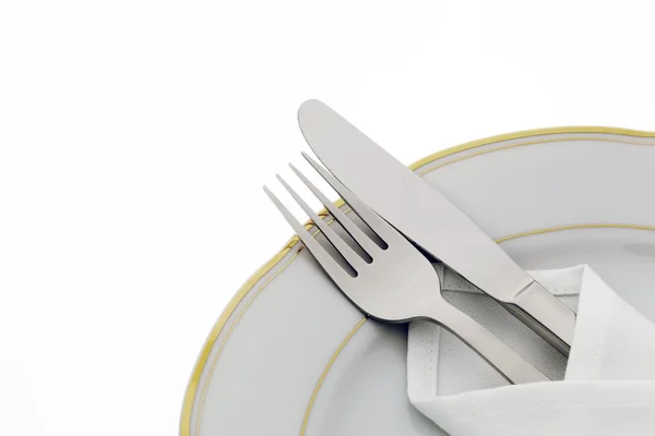 Cuchillos, tenedores y platos — Foto de Stock