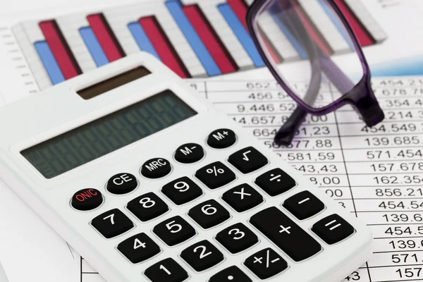 Calculator and figures — Stock Photo, Image
