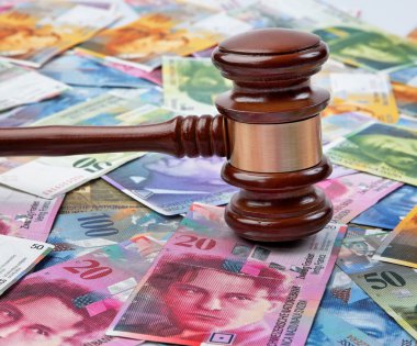 Swiss franc and gavel clipart