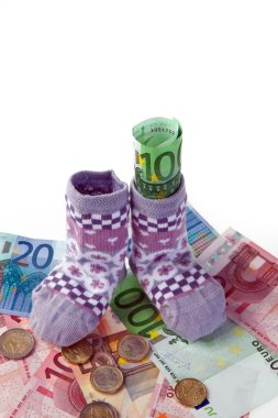 Children's socks and euro banknotes clipart