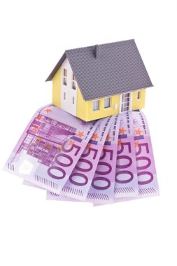 Many euro bank notes and a house clipart
