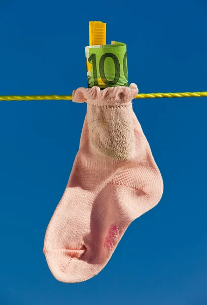 Baby socks on clothesline — Stock Photo, Image