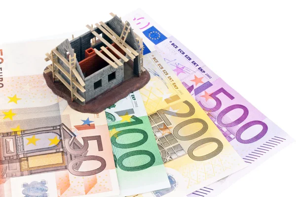 Moeda em euros e notas de franco suíço — Fotografia de Stock