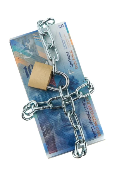 Francs suisses avec serrure et chaîne . — Photo
