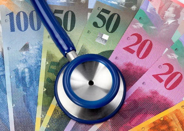 Kostnaderna för hälsa med schweiziska franc — Stockfoto