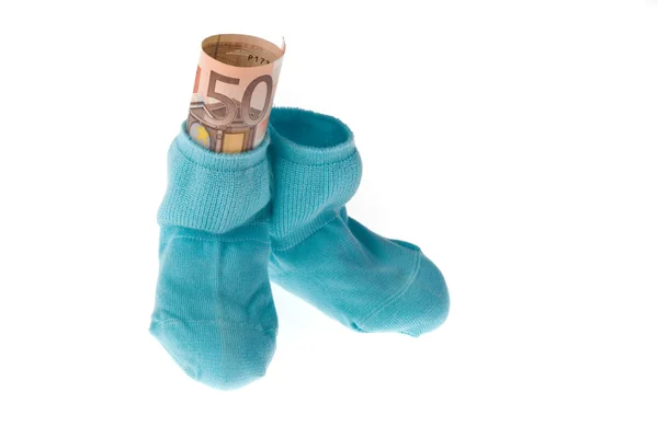 儿童的袜子和欧元纸币 — 图库照片