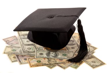 Mortarboard and dollars. clipart