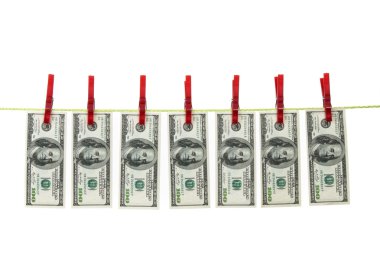 Money laundering with dollars on clothes line clipart