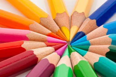 Colored pencils on a white background clipart