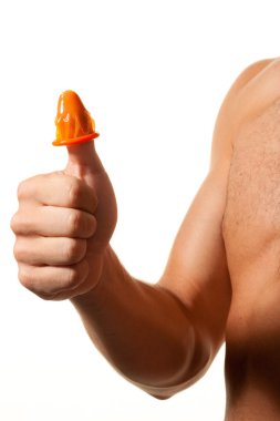 Prevention and protection against aids through a condom. clipart