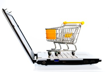 Cart and keyboard. online shopping clipart