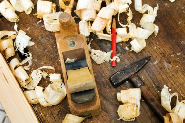 Plane in a carpentry workshop clipart