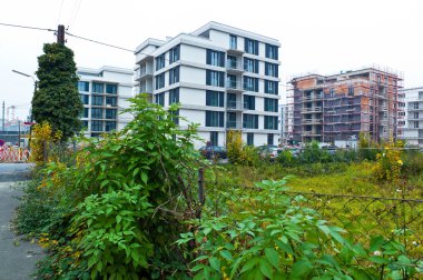 Vacant lot between two houses clipart