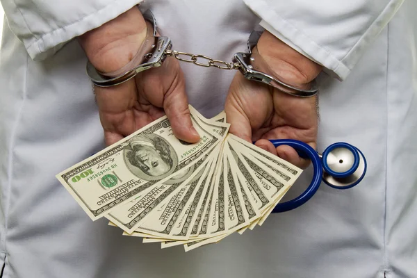 Dollar bills and stethoscope — Stock Photo, Image