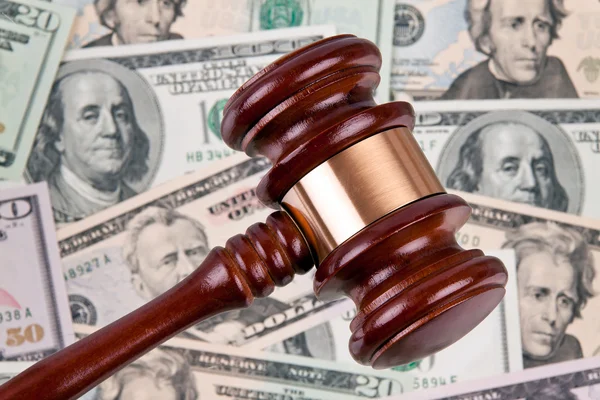 Dollar currency notes with gavel — Stock Photo, Image
