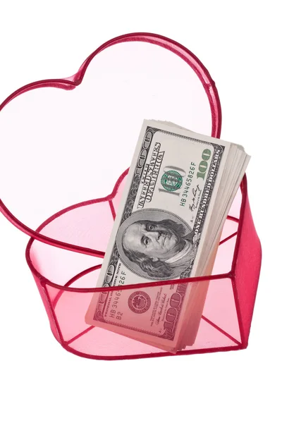 Dolarów rachunki w serce — Zdjęcie stockowe