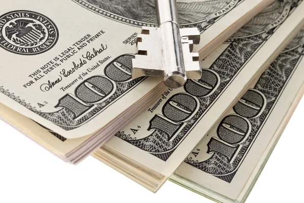 Dolar bankovek a trezor klíče — Stock fotografie
