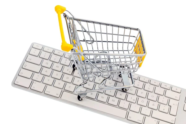 Einkaufswagen und Tastatur. Online-Einkauf — Stockfoto