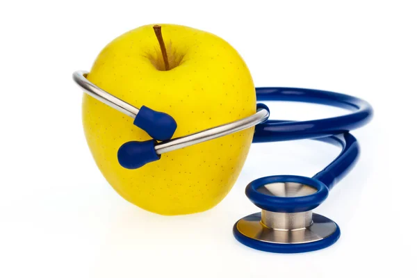 Stéthoscope et pomme. saine alimentation — Photo