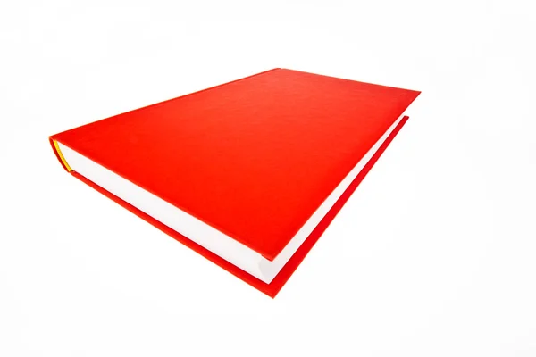 Červená kniha na bílém pozadí — Stock fotografie