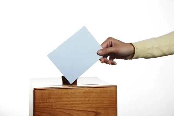 Woman in voting booth — Stock Photo, Image