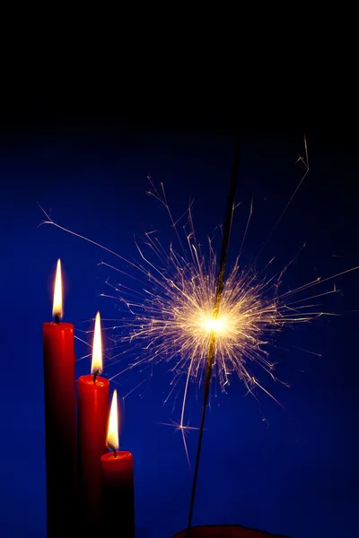 Flame of a candle with a sparkler — Stock Photo, Image