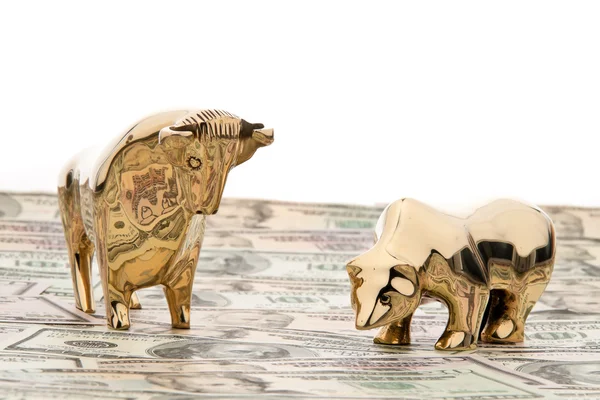 Dollar currency notes with bull and bear — Stock Photo, Image