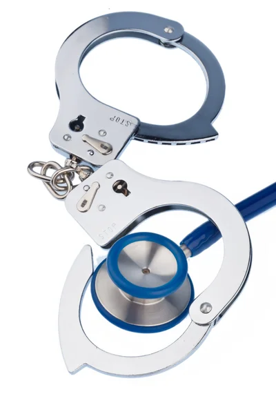 Cuffs and stethoscope — Stock Photo, Image