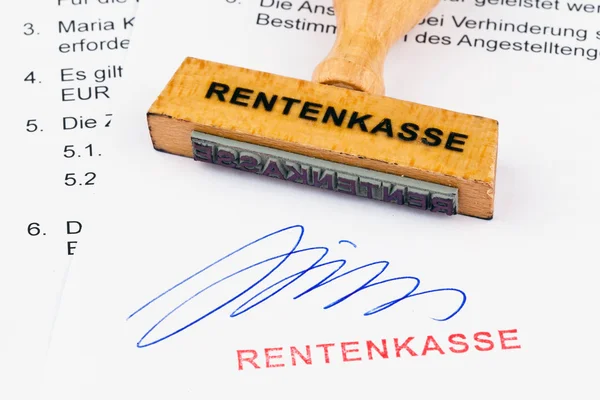 Wooden stamp on the document: retirement fund — Stock Photo, Image