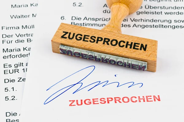 Wooden stamp on the document: awarded — Stock Photo, Image