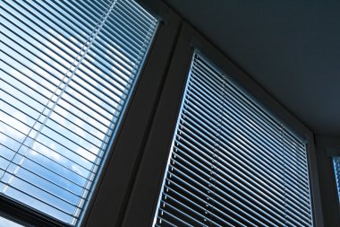 Window blinds for sun protection clipart