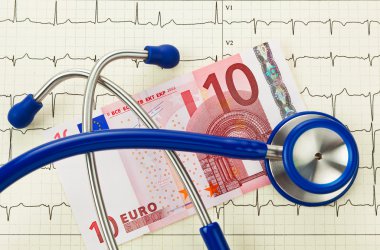 Stethoscope and ten euro note clipart