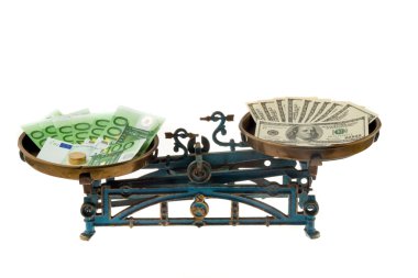 Dollar and euro money on scales clipart